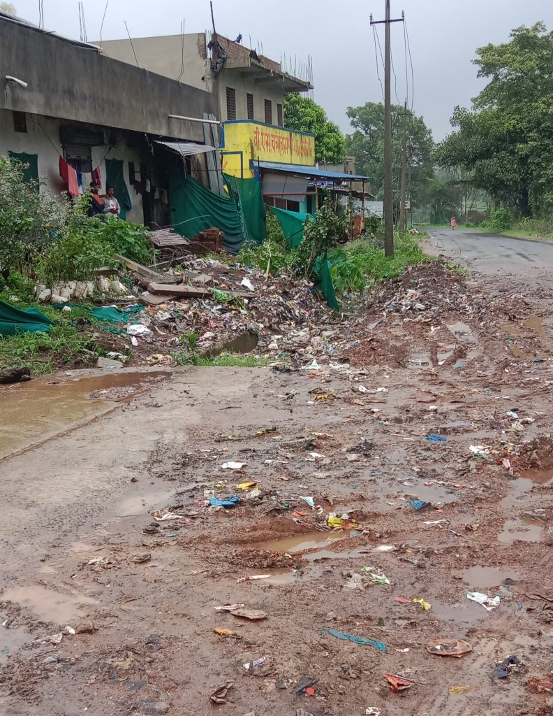 Garbage from 'that' truck on the road : Bad smell in the village
