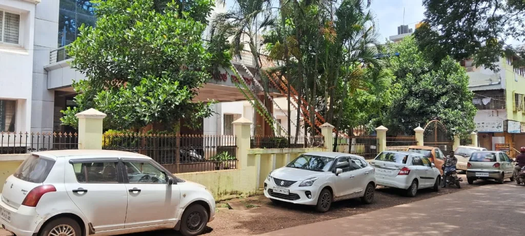 Parking of private vehicles in front of the government office is a pain to the officials