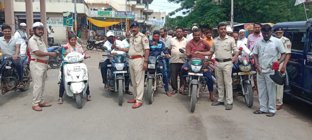 Awareness about the use of helmets by the police force in the district