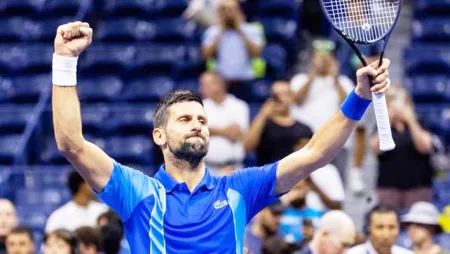 Victory salute from Djokovic, Rudd, Tsitsipas, Goff, Swytek