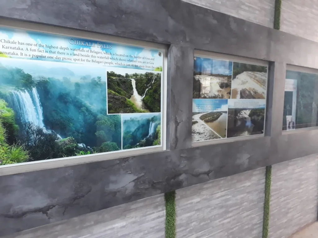 The walls of the collector's office are painted with pictures of tourist places