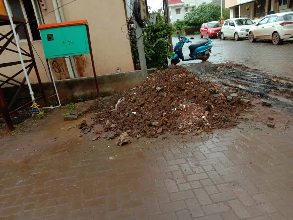 Garbage was removed and placed in front of houses
