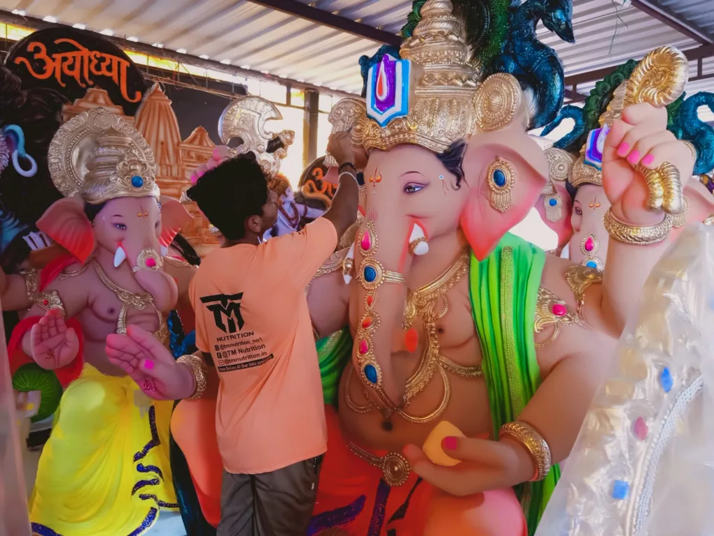 Taking Ganesha idol of Lagbag Pargaon...