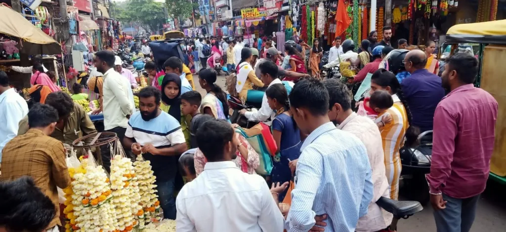 Crowds in the market to buy worship materials