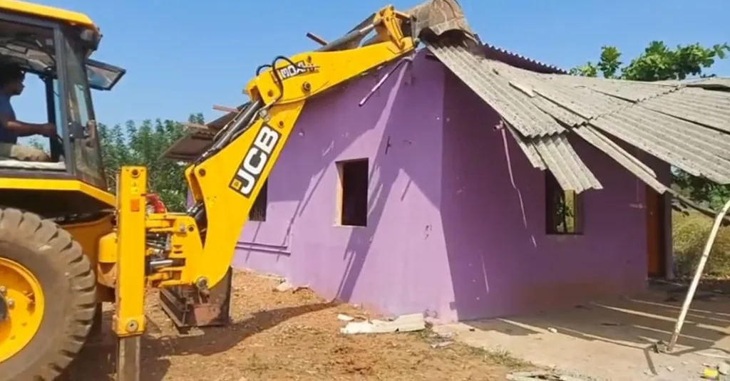 Bulldozers on illegal houses in Zuarinagar