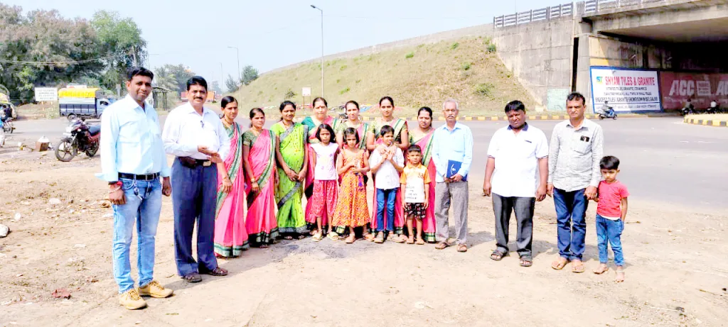 Fill the road potholes near Alarwad Cross