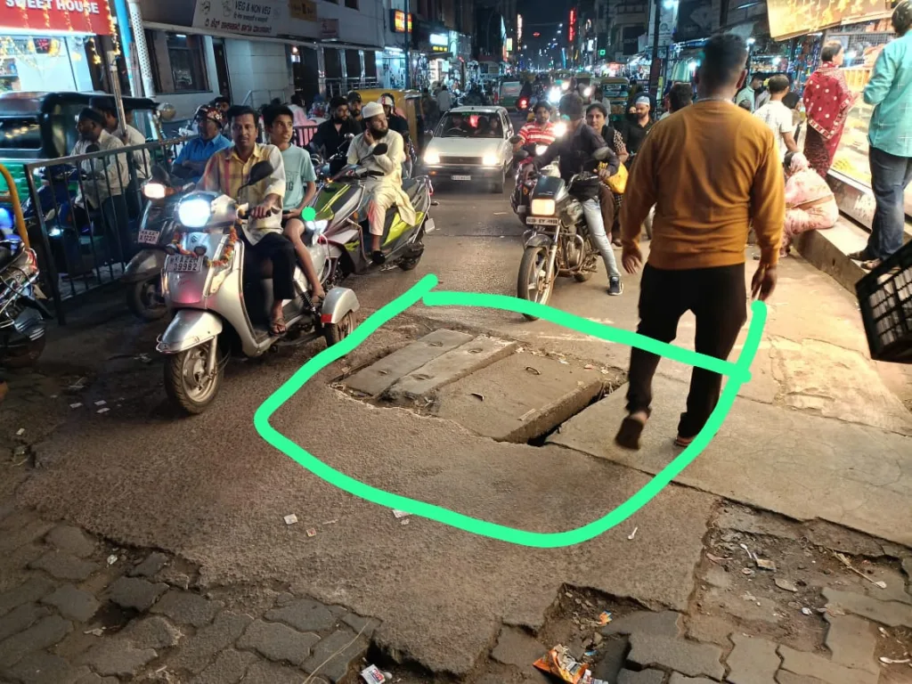 Repair road near Gokul Purohit Sweetmart at Khadebazar