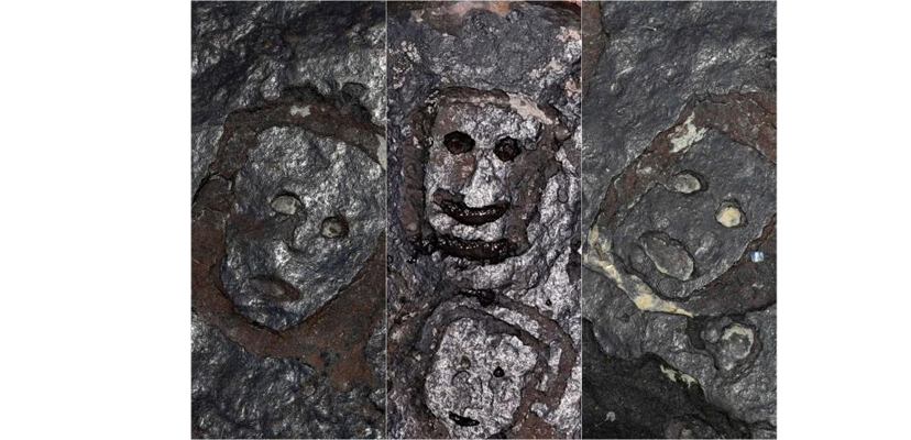 Due to drought, human faces appeared in the river bed