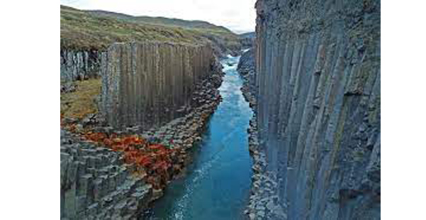The color of the flowing river changes