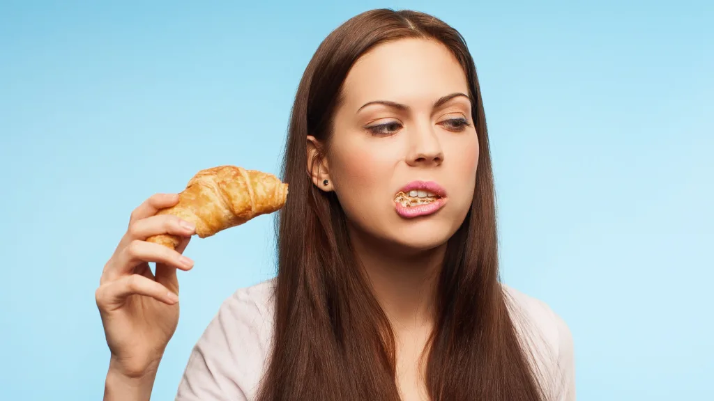 A woman suffering from a rare disease cannot watch anyone eat