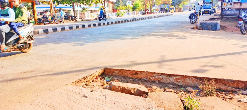 Partial road work in front of SC Motors at Sambara Road Marutinagar