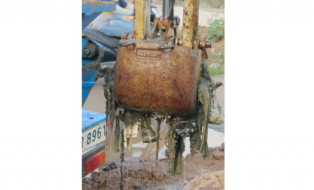 Repairs are underway to stop the sewage flowing on the road