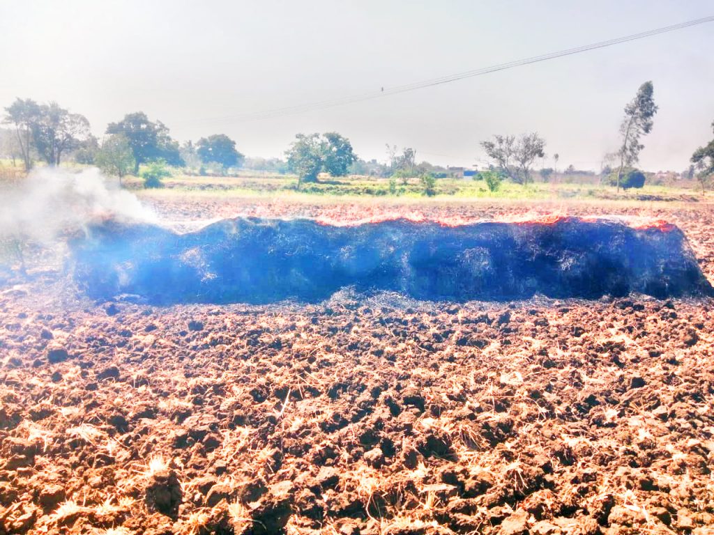 Two hay bales on fire at Halga