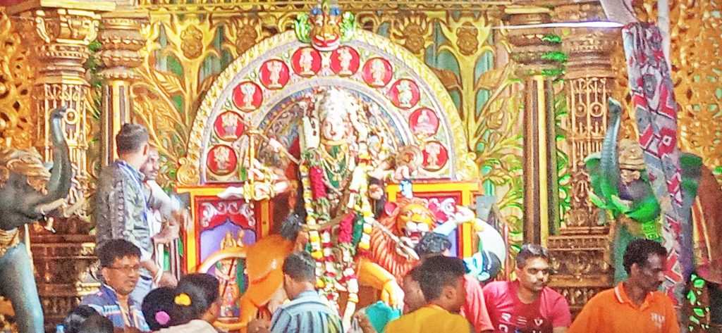 Lakshmi Devi seated on a throne at Karambal