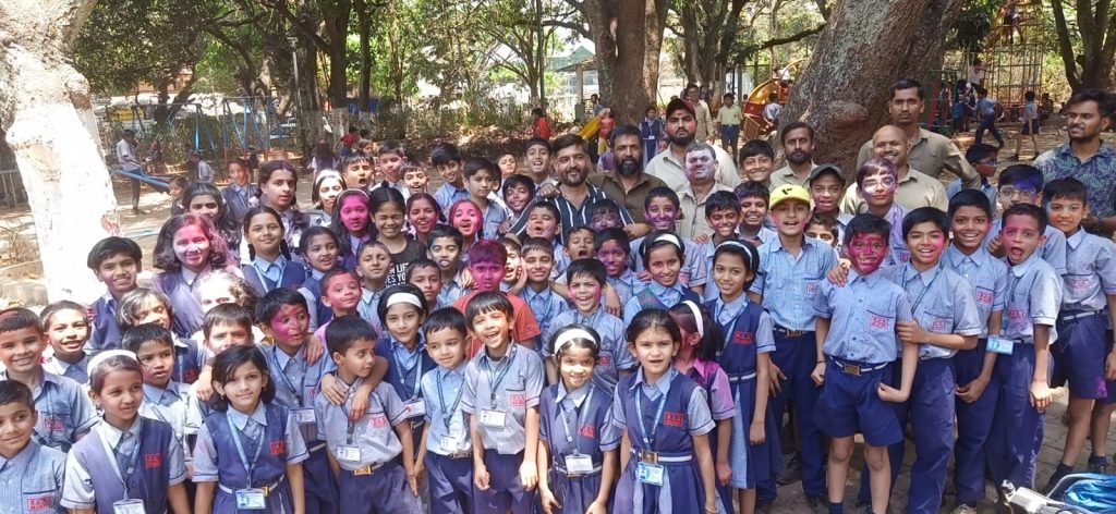 Students frolicking with rickshaw pullers