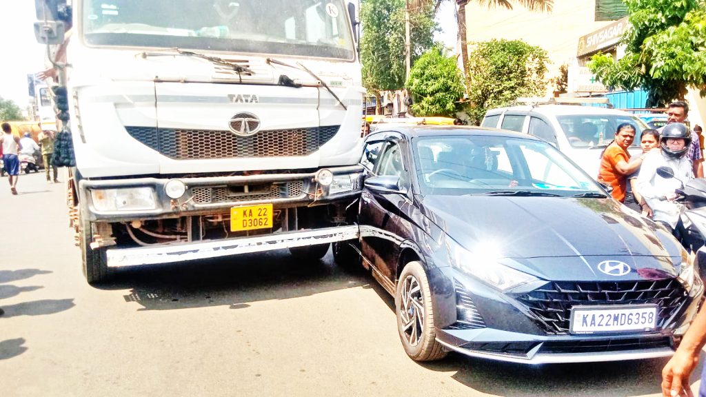 A heavy vehicle collided with a car at Shivaji Maharaj Chowk in Piranwadi